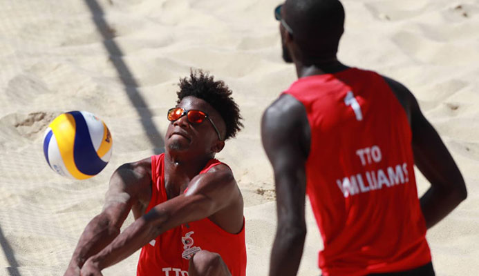 Team TTO's Men's Beach Volleyball team (Red shirt, Black shorts), Daneil Williams (#1) and Daynte Stewart (#2) Photo: Allan V. Crane