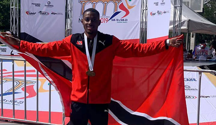 Andwuelle Wright from Signal Hill jumps his way to a new national men's long jump record at the 2018 NGC/Sagicor National Open Championships at the Hasely Crawford stadium in Port of Spain, last year. PHOTO BY ANDRE DE GANNES