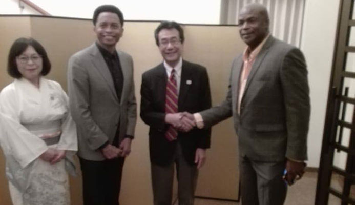 TT's first Olympic gold medallist Hasely Crawford,right, shakes hands with Ambassador to Japan Tatsuo Hirayama, at a Tokyo Olympic Games 2020 countdown celebration, at the abassador's residence, in St Clair, on Friday evening. At right, wife of the amabassador Sachiko Hirayama and TT Olympic president Brian Lewis look on.