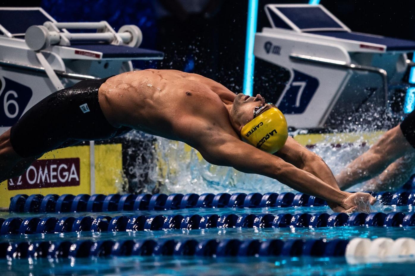 FULL STRETCH: Los Angeles Current’s Dylan Carter gets off to a quick start in the Men’s 100m backstroke, during match number 10 of the International Swimming League (ISL) 2020, at the Duna Arena in Budapest, Hungary, yesterday. Carter bagged silver in the event, in a new national record time of 50.11 seconds. --Photo courtesy ISL