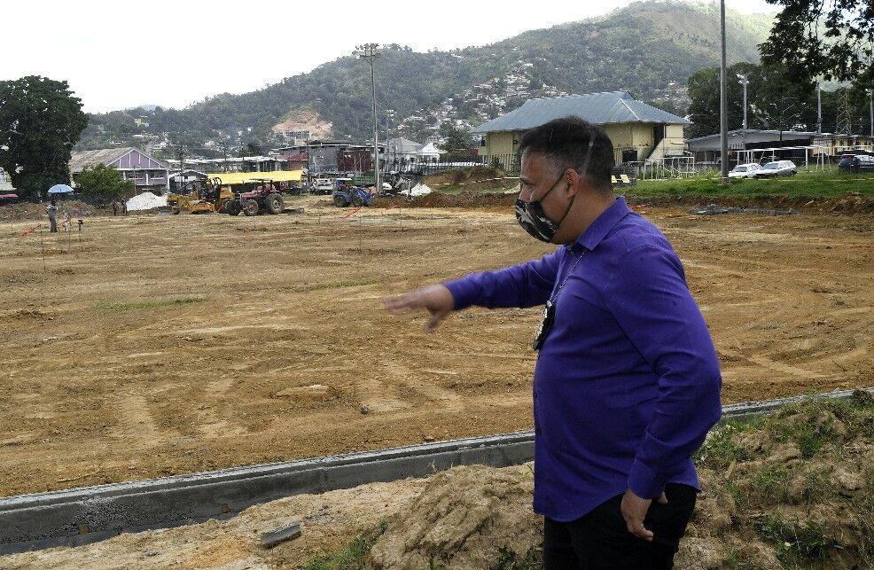 TALKING TURF: Commissioner of Police Gary Griffith gives details about the US$100,000 new CCGrass astroturf that is to be installed by March at the Police Barracks in St James.  —Photo: JERMAINE CRUICKSHANK