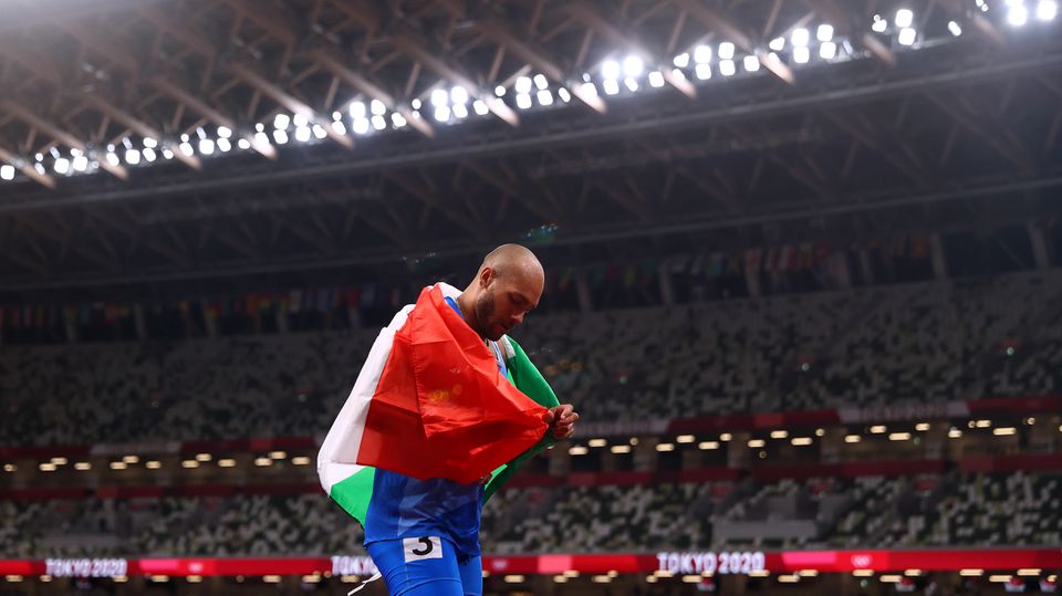 Tokyo 2020 Olympics - Athletics - Men's 100m - Final - OLS - Olympic Stadium, Tokyo, Japan - August 1, 2021. Lamont Marcell Jacobs of Italy celebrates after winning gold REUTERS/Andrew Boyers