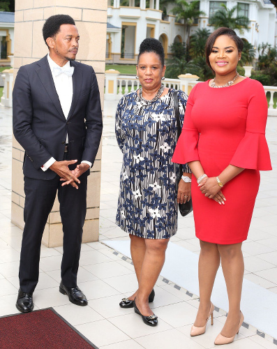 Photo: TTOC president Brian Lewis (left) and secretary general Annette Knott (centre) chat with Minister of Sport and Community Development Shamfa Cudjoe. (via TTOC)