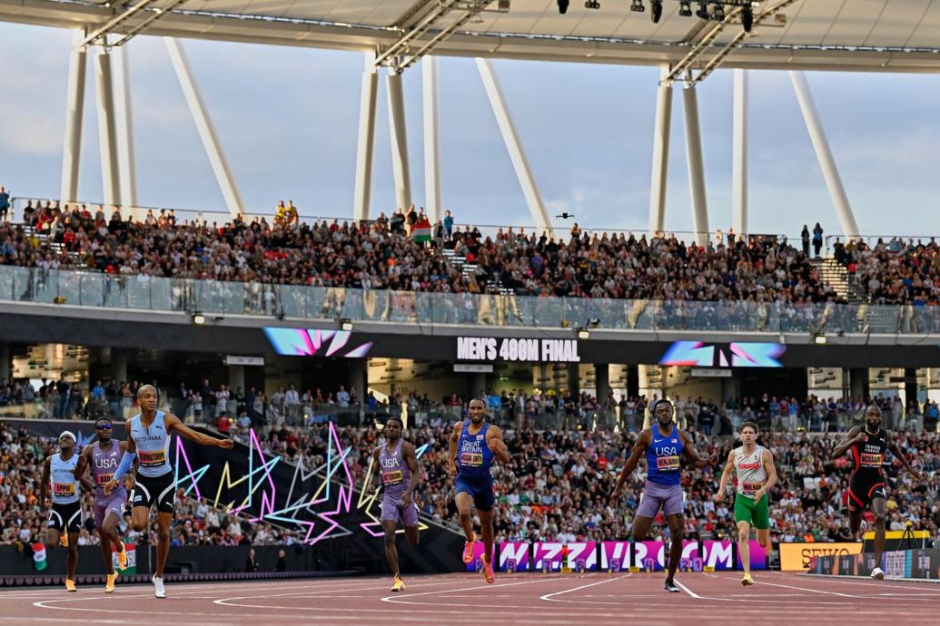 ULTIMATE WINNER: Busang Collen Kebinatshipi, left, of Botswana, wins the Men’s 400 metres final during the World Athletics Ultimate Championship in Budapest, Hungary, yesterday. At right is T&T’s Jereem Richards. —Photo: AP  Denes Erdos (Image obtained at trinidadexpress.com)